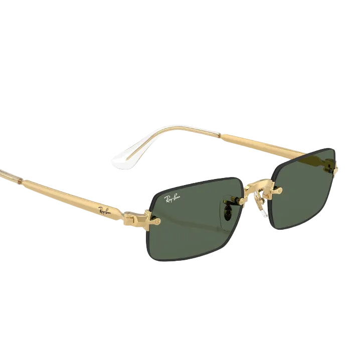 Gold-framed sunglasses with green lenses on a white background
