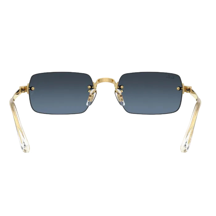 Gold-framed sunglasses with blue gradient lenses on a white background