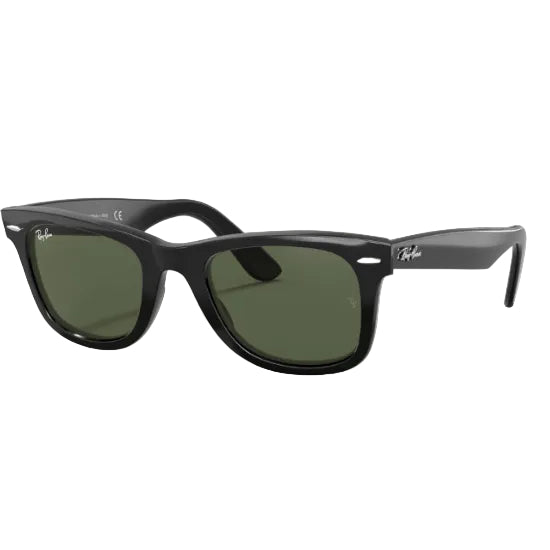 Tortoiseshell sunglasses with green lenses on a white background