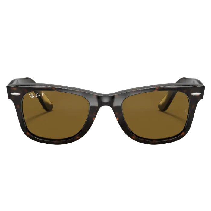 Sunglasses with brown lenses and tortoiseshell frame on a white background