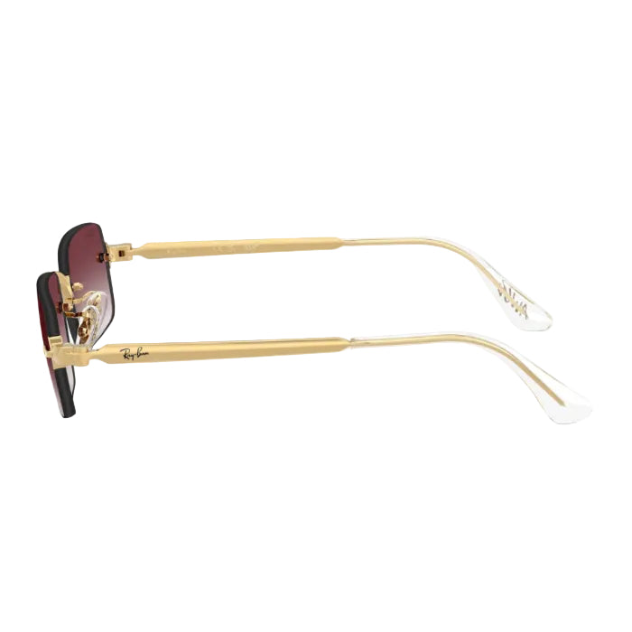 Gold-framed sunglasses with a reflective surface on a white background