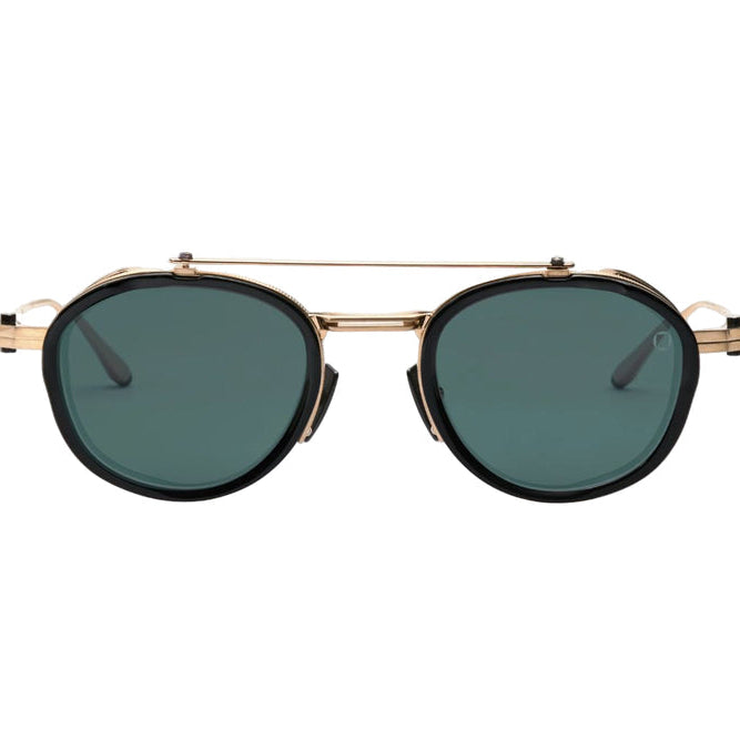 Gold-framed sunglasses with dark lenses on a white background
