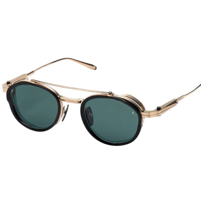 Sunglasses with gold frame and dark lenses on a white background