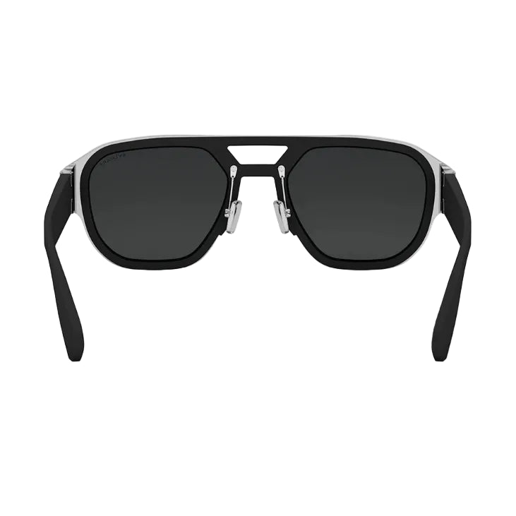 A pair of modern aviator-style sunglasses with thick black frames, dark lenses, and silver metal bridge and temple tips, shown against a plain white background.