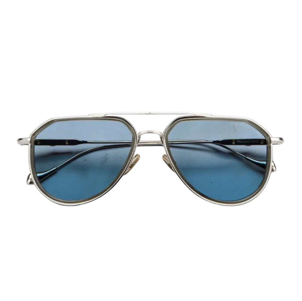 A pair of aviator-style sunglasses with a thin silver metal frame and blue-tinted lenses, shown against a plain white background.