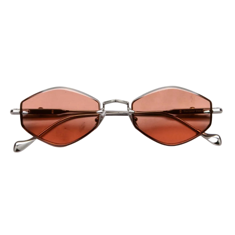 Rimless sunglasses with a silver metal frame and translucent amber-brown lenses, shown from the front on a plain white background.