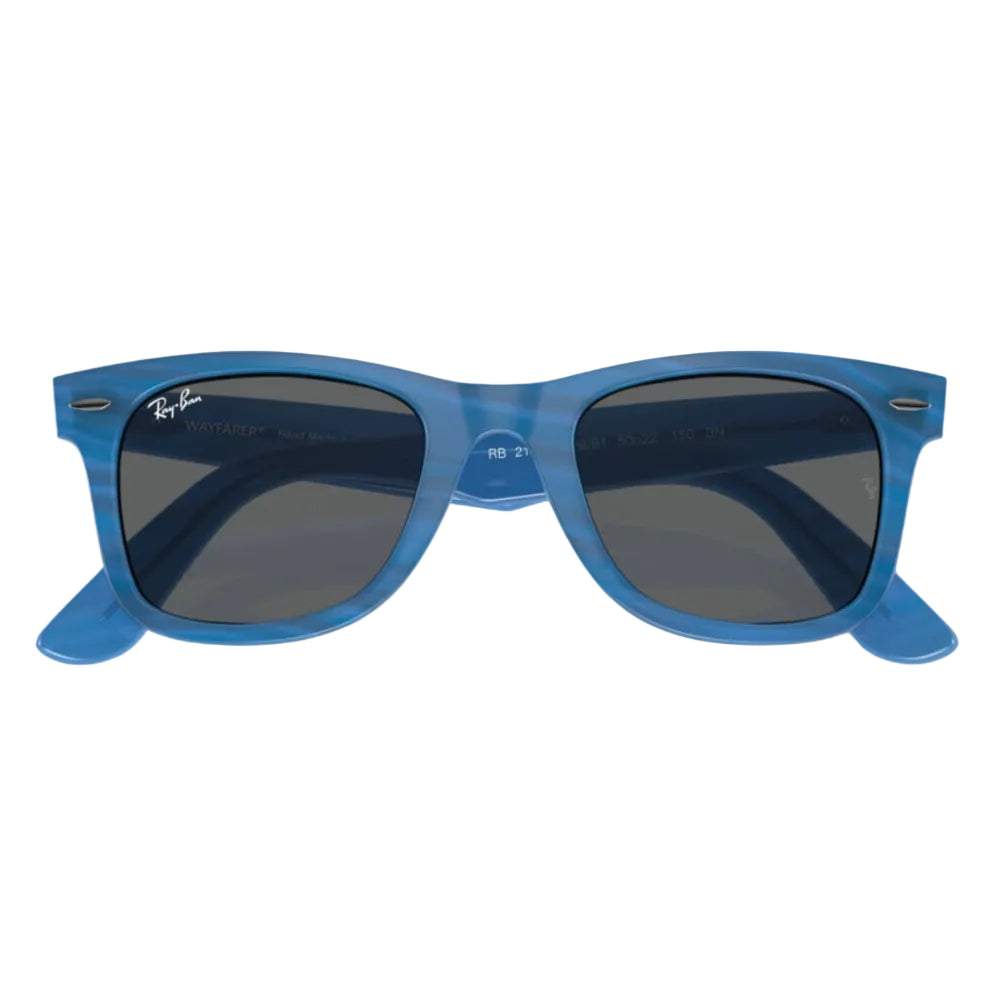 Blue sunglasses with dark lenses on a white background