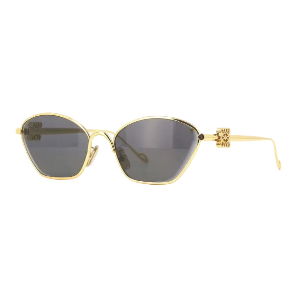Gold-framed cat-eye sunglasses with dark gray lenses and a decorative gold temple detail, shown against a plain white background.